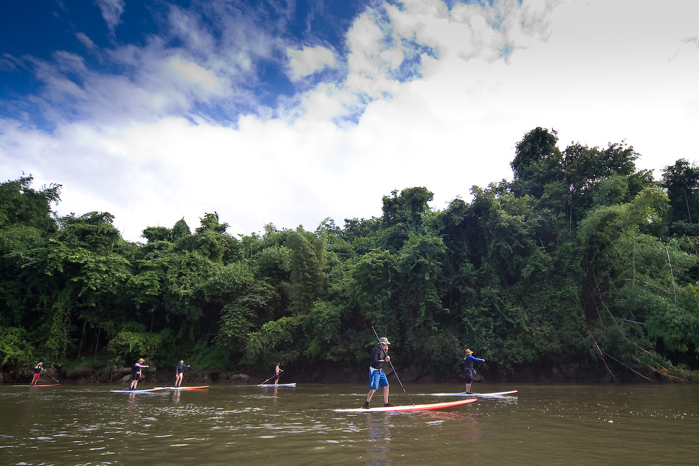 Sailing down the river Kwai on a SUP