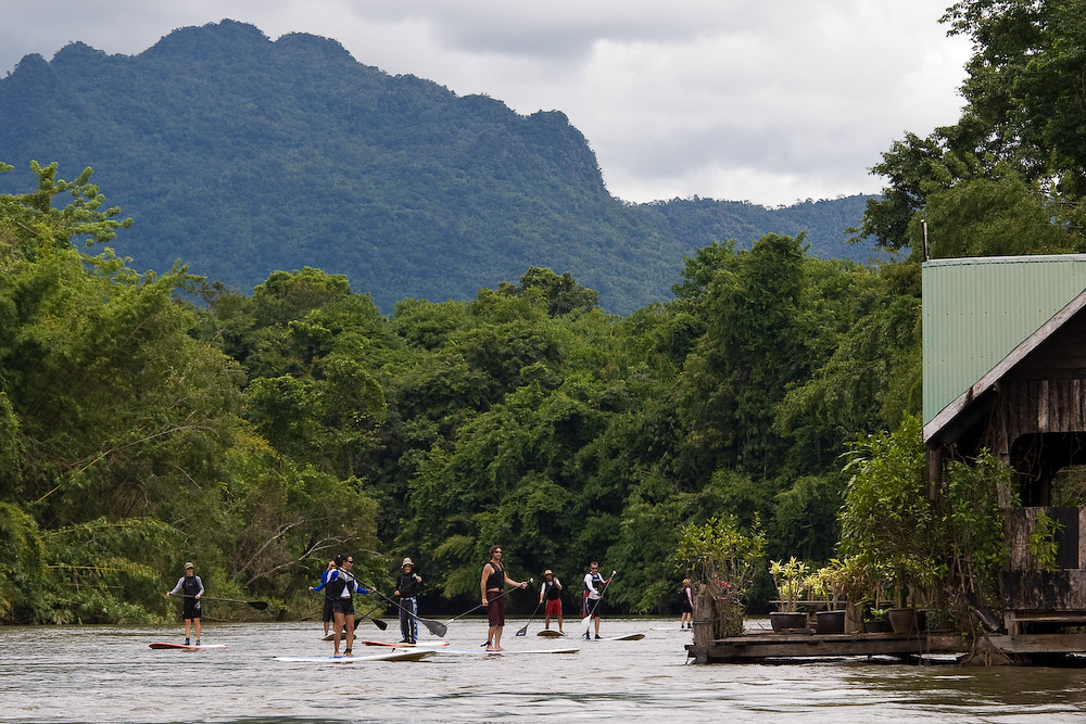 Sailing down the river Kwai on a SUP