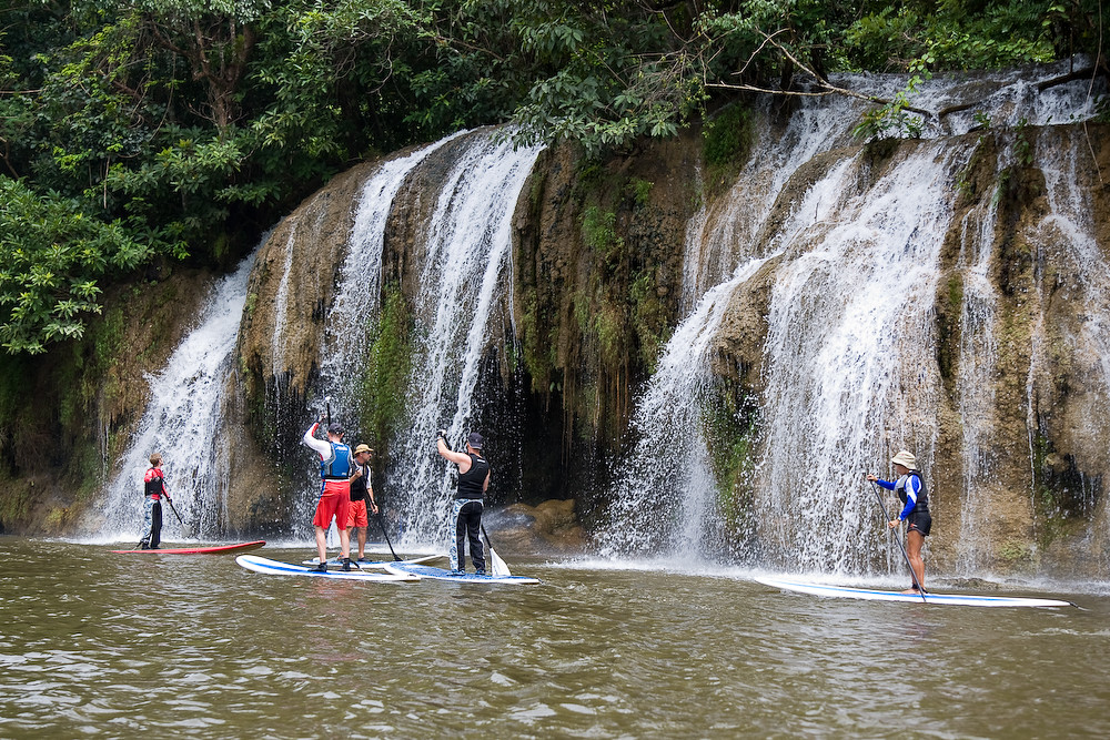 Sailing down the river Kwai on a SUP