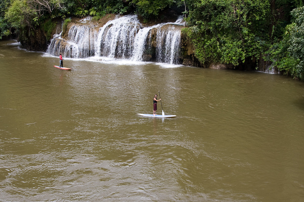 Sailing down the river Kwai on a SUP