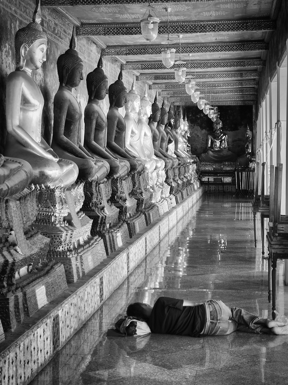 Reclining (next to a) Buddha